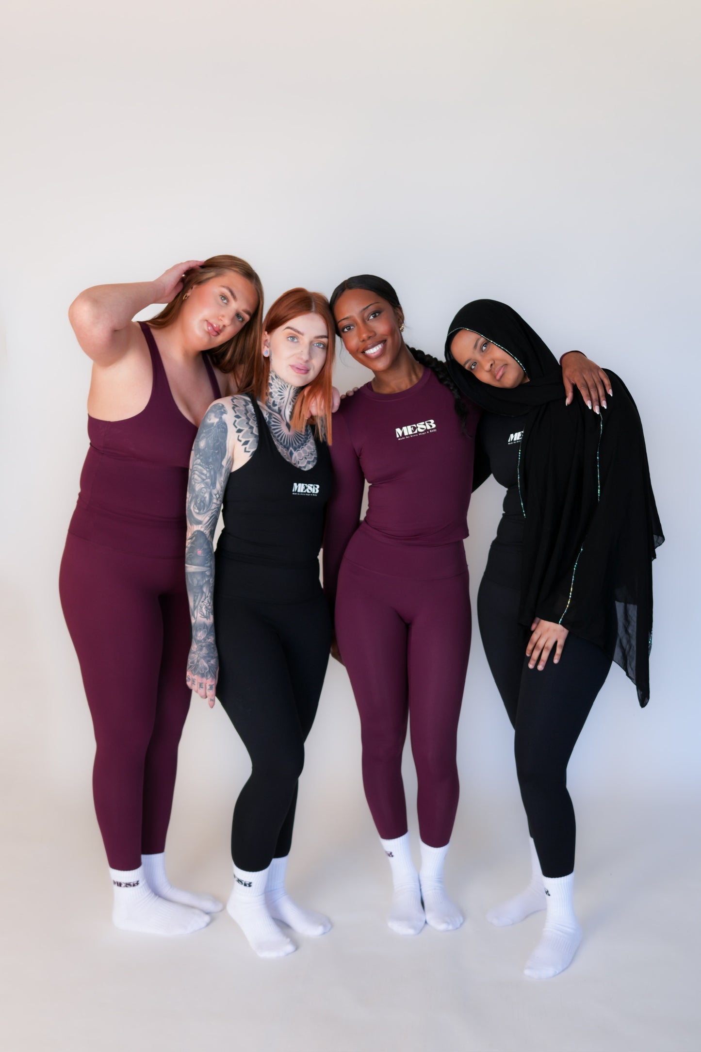 4 models wearing MESB gym wear
